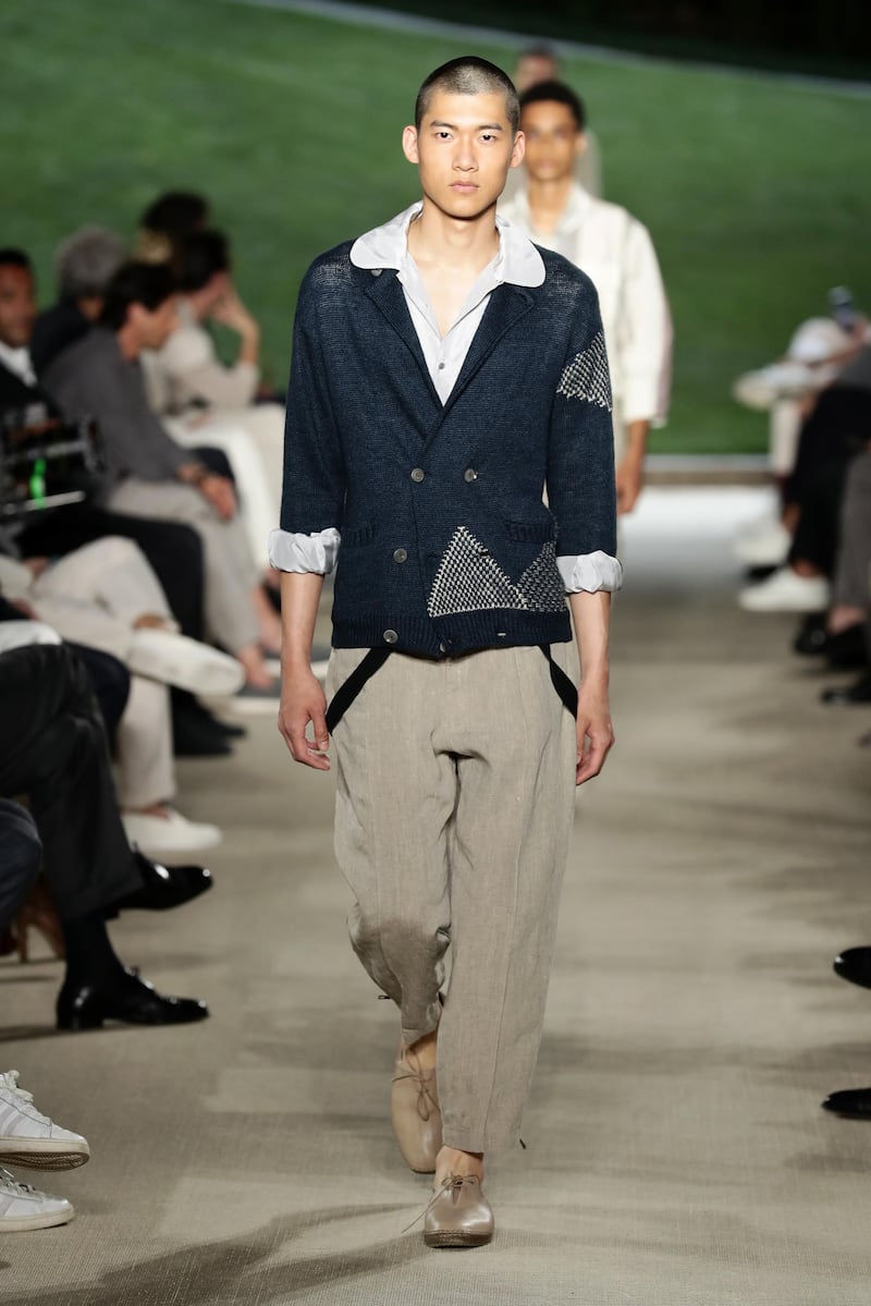 A model walks the runway during the Giorgio Armani show at Milan Men's Fashion Week on June 21, 2021 in Milan, Italy. Getty Images