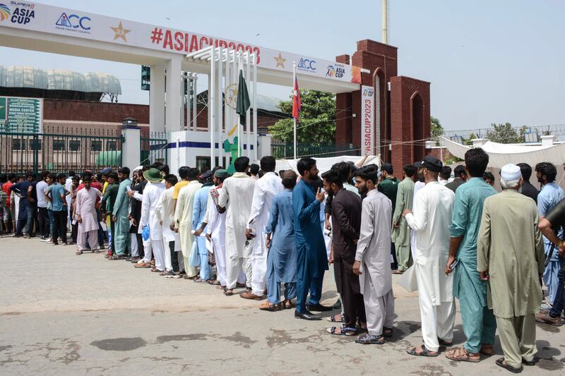 Spectators line up outside the stadium before the start of the Asia Cup cricket match between Pakistan and Nepal at the Multan Cricket Stadium. AFP