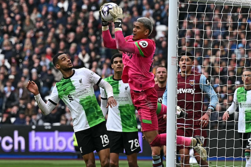West Ham United goalkeeper Alphonse Areola claims the ball under pressure. AFP