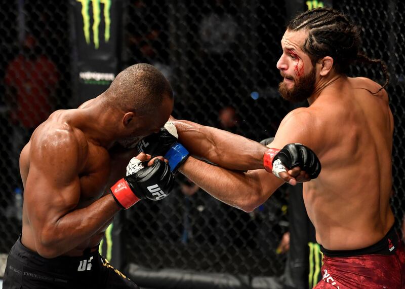 ABU DHABI, UNITED ARAB EMIRATES - JULY 12: (R-L) Jorge Masvidal punches Kamaru Usman of Nigeria in their UFC welterweight championship fight during the UFC 251 event at Flash Forum on UFC Fight Island on July 12, 2020 on Yas Island, Abu Dhabi, United Arab Emirates. (Photo by Jeff Bottari/Zuffa LLC) *** Local Caption *** ABU DHABI, UNITED ARAB EMIRATES - JULY 12: (R-L) Jorge Masvidal punches Kamaru Usman of Nigeria in their UFC welterweight championship fight during the UFC 251 event at Flash Forum on UFC Fight Island on July 12, 2020 on Yas Island, Abu Dhabi, United Arab Emirates. (Photo by Jeff Bottari/Zuffa LLC)