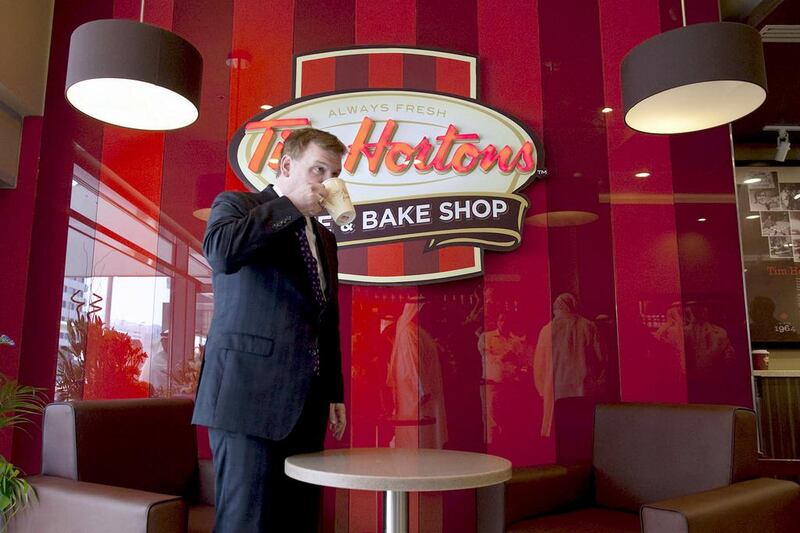 Canada’s foreign Minister John Baird has coffee at the Tim Hortons outlet at Abu Dhabi Mall. Christopher Pike / The National