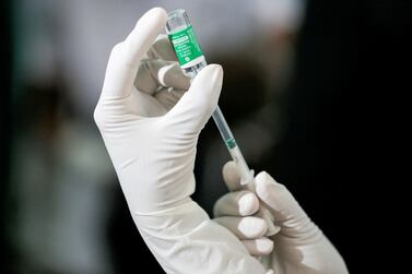 A health official draws a dose of AstraZeneca's Covid-19 vaccine. The misinformation about Covid-19 vaccines is largely to be blamed for vaccine hesitancy. Reuters
