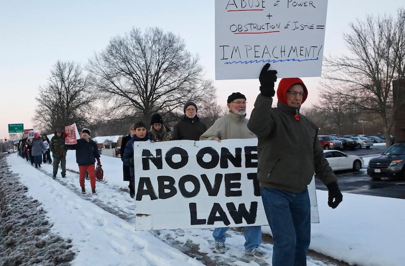 Approximately 350 protesters converged on Congresswoman Ann Wagner's office in Ballwin, Missouri, demanding that she vote for President Donald Trump's impeachment in the US House of Representatives. AP