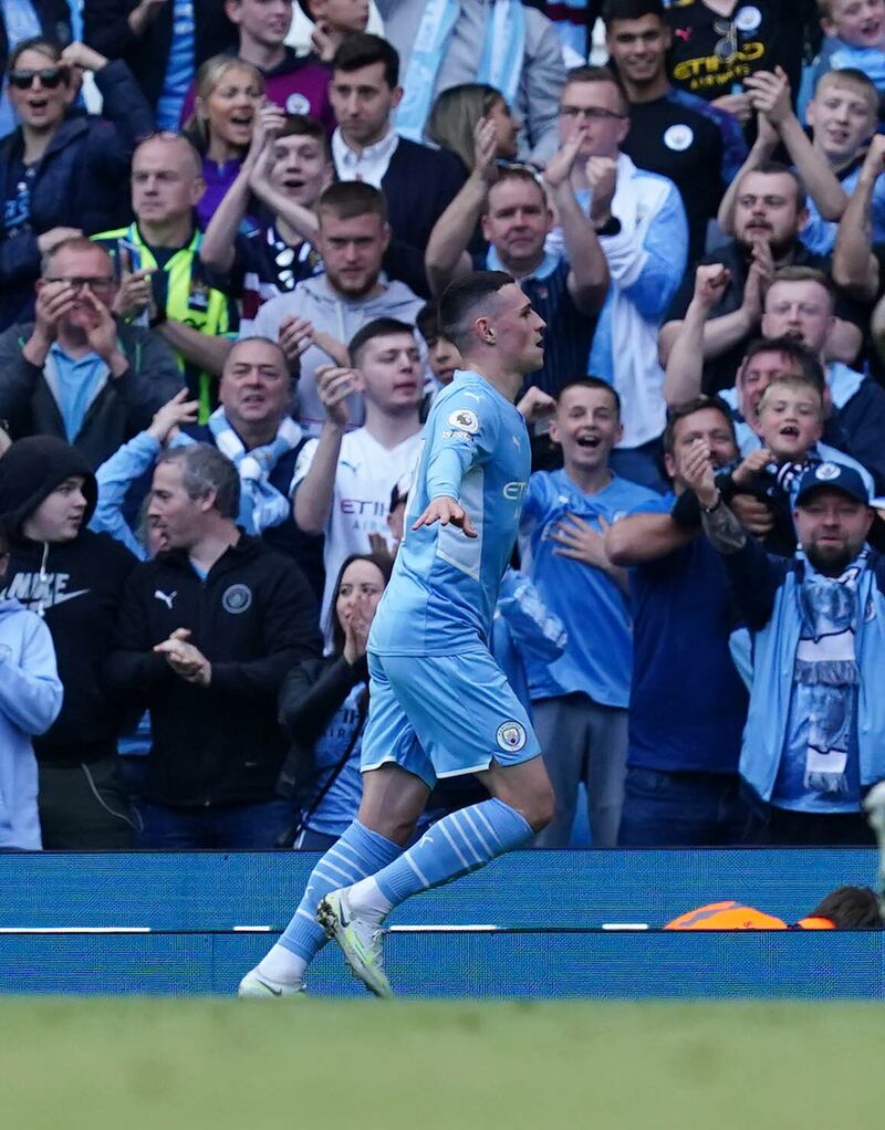 City substitute Phil Foden celebrates scoring the fourth goal. PA