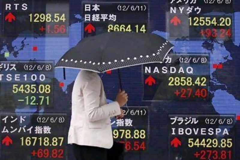 Stocks markets across the world, including the Nikkei in Japan, were up yesterday following a rescue plan for Spanish banks. Yuriko Nakao / Reuters