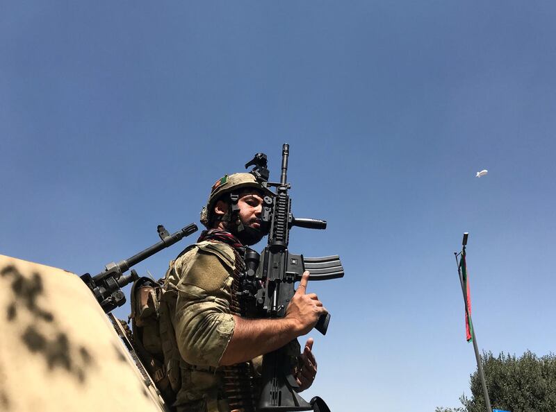 A member of the Afghan security forces keeps watch at the site of an attack in Kabul, Afghanistan. Reuters