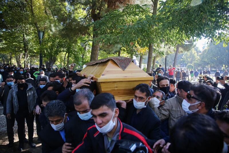Fans and family members carry a coffin with the body of Mohammad Reza Shajarian, Iran's most celebrated musician, during his funeral procession in the Mashhad province on October 10, 2020. Reuters
