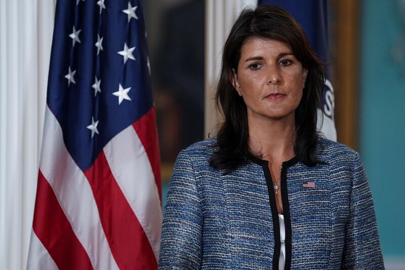 U.S. Ambassador to the United Nations Nikki Haley listens as U.S. Secretary of State Mike Pompeo (not pictured) delivers remarks to the press, announcing the U.S.'s withdrawal from the U.N's Human Rights Council at the Department of State in Washington, U.S., June 19, 2018. REUTERS/Toya Sarno Jordan