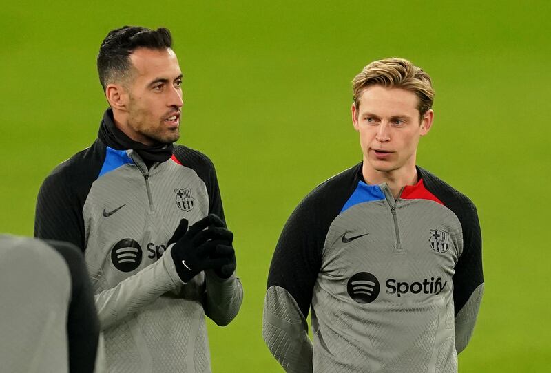 Barcelona's Sergio Busquets, left, and Frenkie de Jong during a training session at Old Trafford. PA