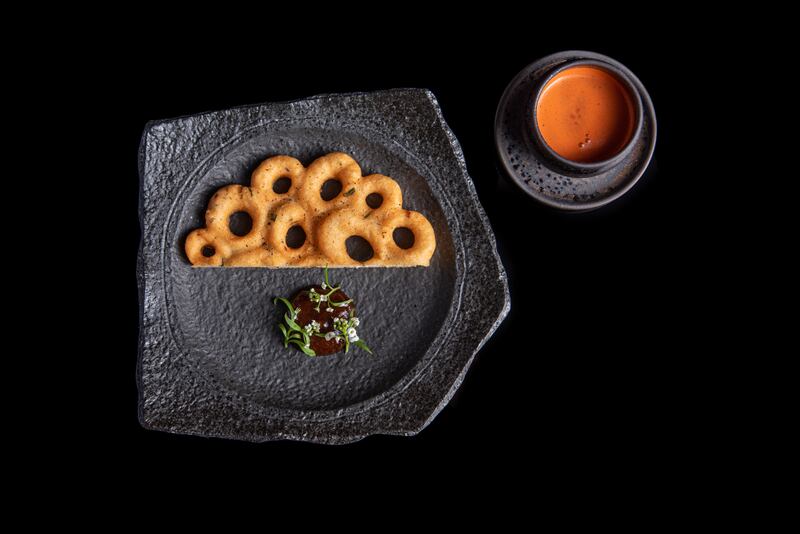 Dal vada with carrot kanji and black lemon pickle.