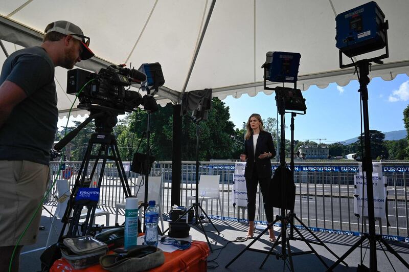 A news crew at work before the summit. AFP