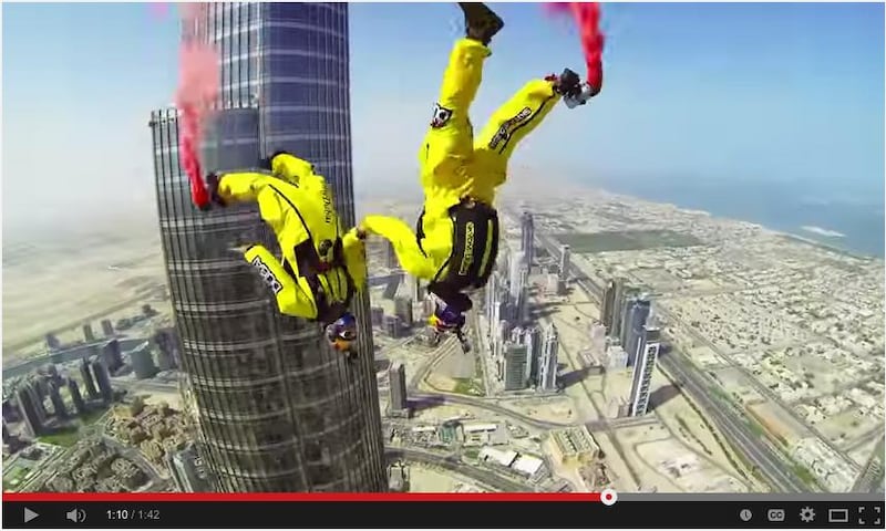 In this screengrab from YouTube, Vince Reffet and Fred Fugen break the world record for base jumping from the top of the Burj Khalifa.
