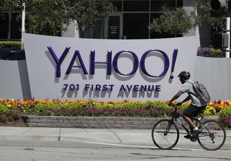 A cyclist rides past a Yahoo sign at the company's headquarters in Sunnyvale, California. The Yahoo hack exposed personal details from more than 1 billion user accounts, potentially the largest breach of an email provider in history. Marcio Jose Sanchez / AP Photo