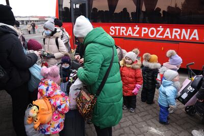 Women and children fleeing war-torn Ukraine arrive in Poland at the Korczowa border crossing. Getty Images