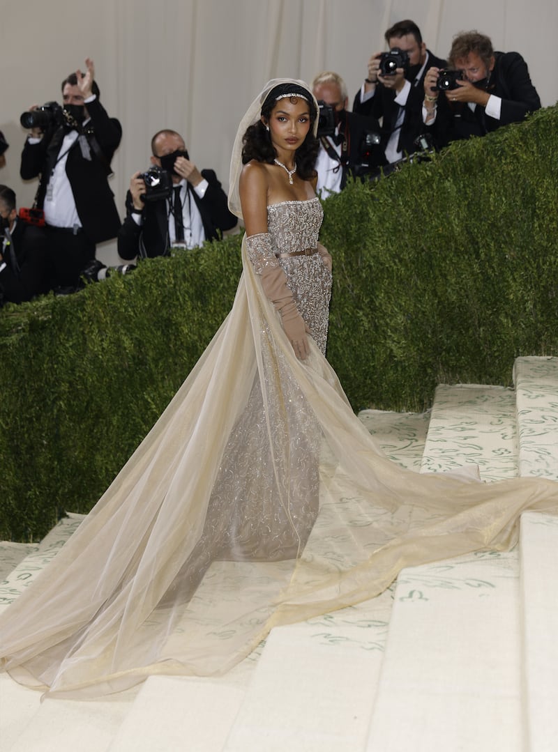 Yara Shahidi in gold Dior at the 2021 Met Gala. EPA 