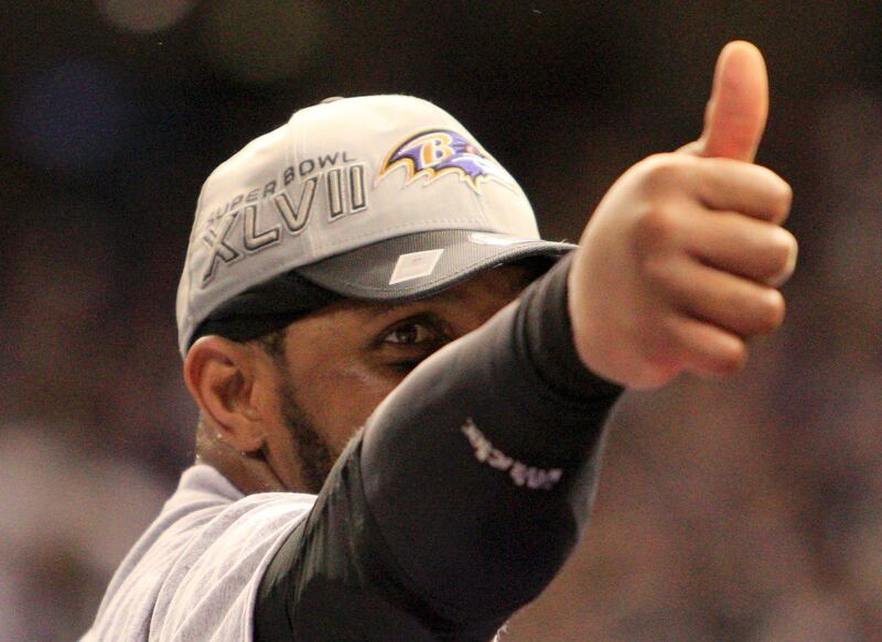 Baltimore Ravens' Ray Lewis reacts on the podium after his team defeated the San Francisco 49ers in the NFL Super Bowl XLVII football game in New Orleans, Louisiana, February 3, 2013. REUTERS/Sean Gardner (UNITED STATES  - Tags: SPORT FOOTBALL)   *** Local Caption ***  NEO817_NFL-SUPERBOW_0204_11.JPG