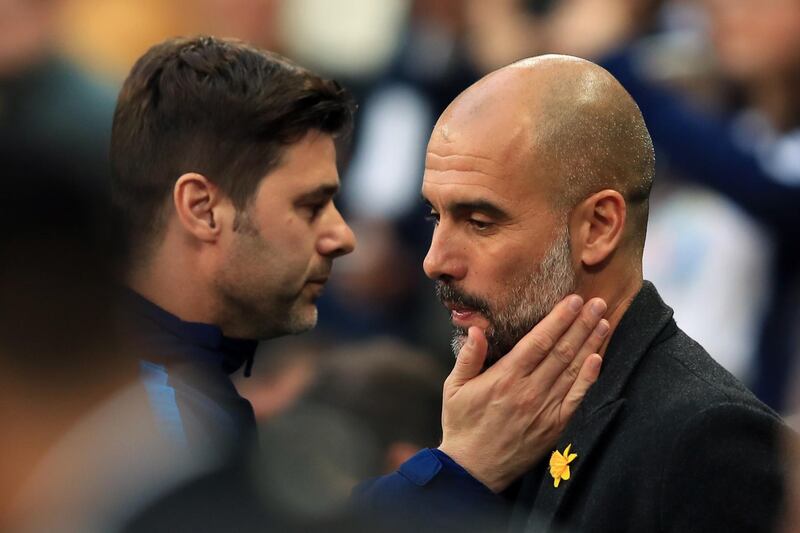 LONDON, ENGLAND - APRIL 14: Mauricio Pochettino manager of Tottenham Hotspur with Pep Guardiola manager of Manchester City during the Premier League match between Tottenham Hotspur and Manchester City at Wembley Stadium on April 14, 2018 in London, England. (Photo by Marc Atkins/Offside/Getty Images)