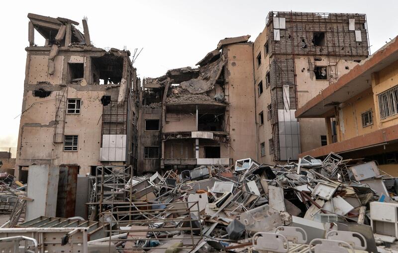 Medical equipment are pictured abandoned in the compound of the destroyed Mosul general Hospital on October 12, 2020 in northen Iraq. Iraq in December will marked the third anniversary since declaring victory in the three-year war against the Islamic State (IS) group, which had left the country's former second city and the jihadists' capital in ruin. / AFP / Zaid AL-OBEIDI
