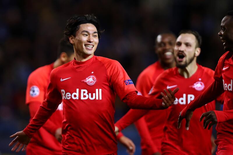 Takumi Minamino impressed Liverpool during Salzburg's Champions League matches against them. Getty Images