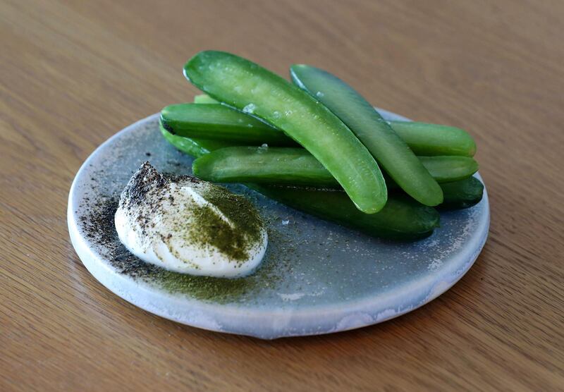 Dubai, United Arab Emirates - April 24, 2019: Postcard: Lowe Dubai restaurant. Pressed cucumbers with smoked labne. Wednesday the 24th of April 2019. KOA Canvas, Dubai. Chris Whiteoak / The National