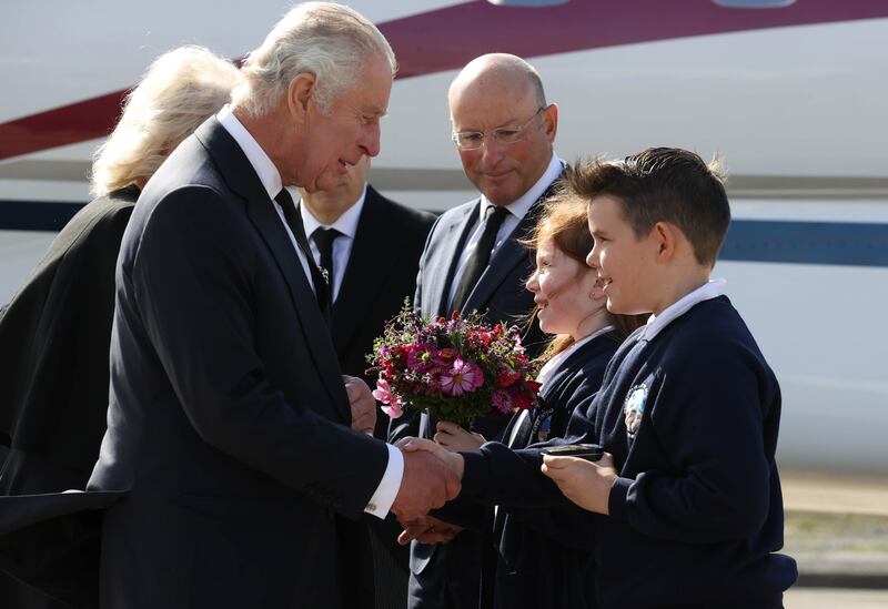 The king is greeted as he arrives at Belfast City Airport. Getty Images