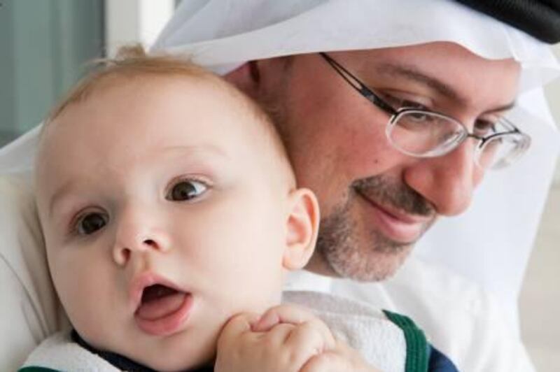 1 year old, Daniel Raed Alawadhi with his father Raed Alawadhi. Genetic disease conference, Intercontinental Hotel, Dubai. 27th Feb 2011. Duncan Chard for the National