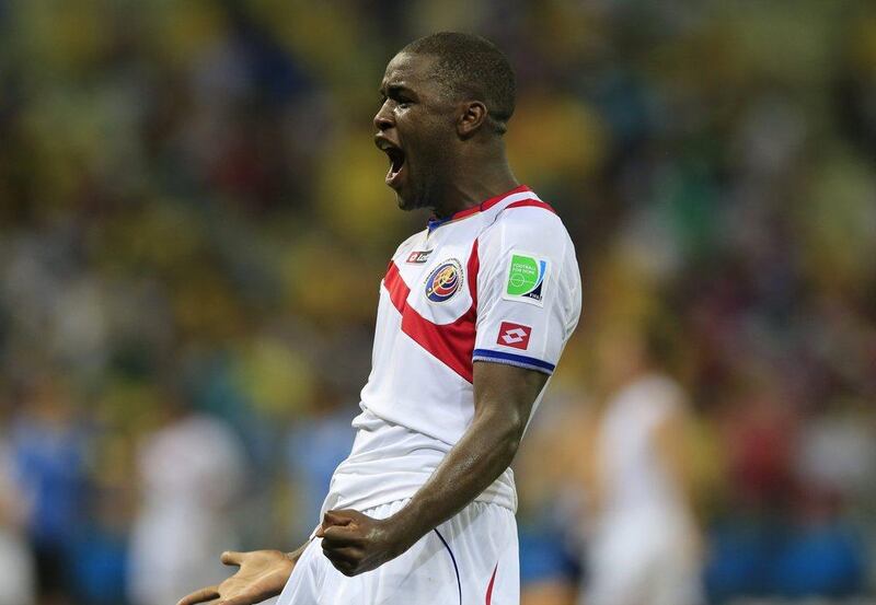 Joel Campbell celebrates after his goal against Uruguay on Saturday at the 2014 World Cup for Costa Rica. Bernat Armangue / AP / June 14, 2014