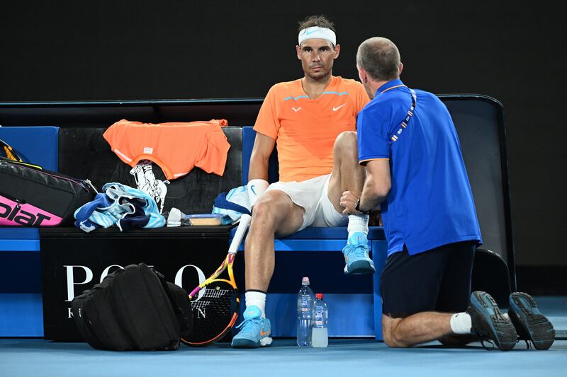 Rafael Nadal medical treatment during his match against Mackenzie McDonald at the Australian Open. EPA