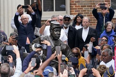People view the statue honouring black enslaved men who enlisted in the US coloured troops and served in the Civil War after it was unveiled in Franklin, Tennessee, last October. AP Photo