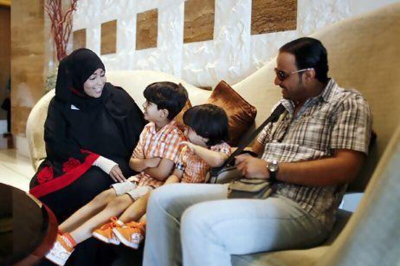 Fatma Al Shabibi with guests at the hotel. Sarah Dea / The National