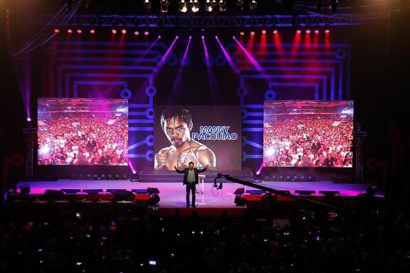 Manny Pacquiao gives an inspiration talk to a crowd of thousands in Manila last year, telling his story and discussing his religious faith. Mike Young for The National / May 8, 2014