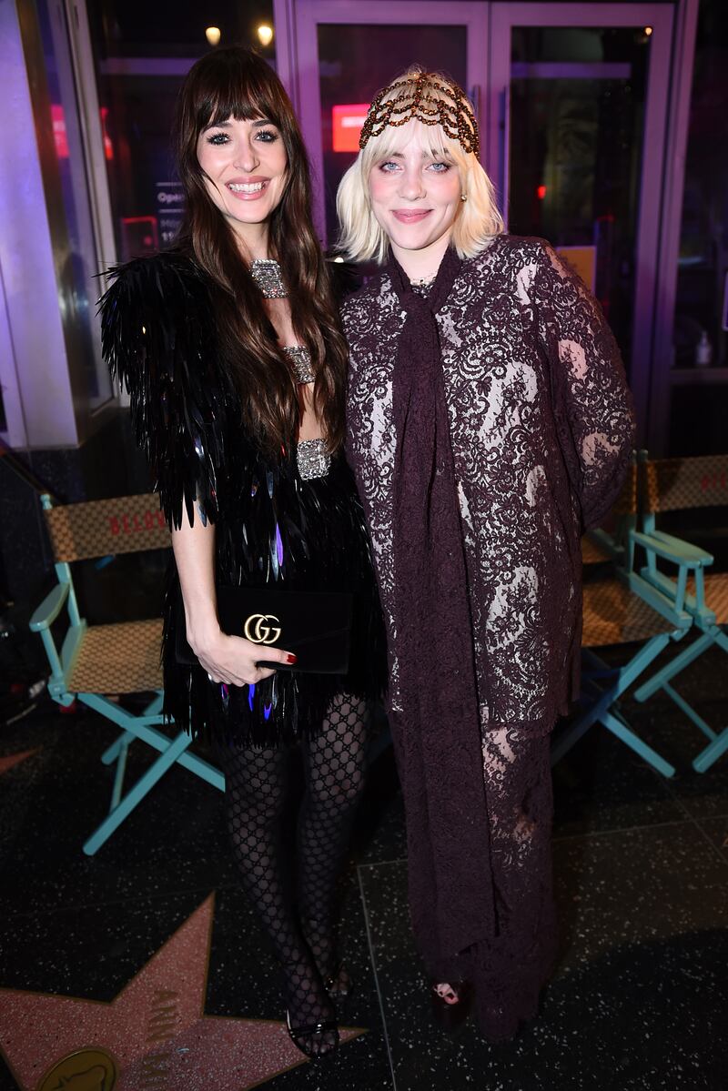 Dakota Johnson and Billie Eilish. AP