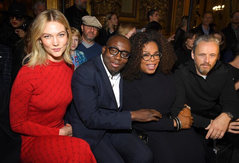 Karlie Kloss, Edward Enninful, Oprah Winfrey and Alasdhair Willis front row at Stella McCartney in Paris (Photo by Pascal Le Segretain/Getty Images)