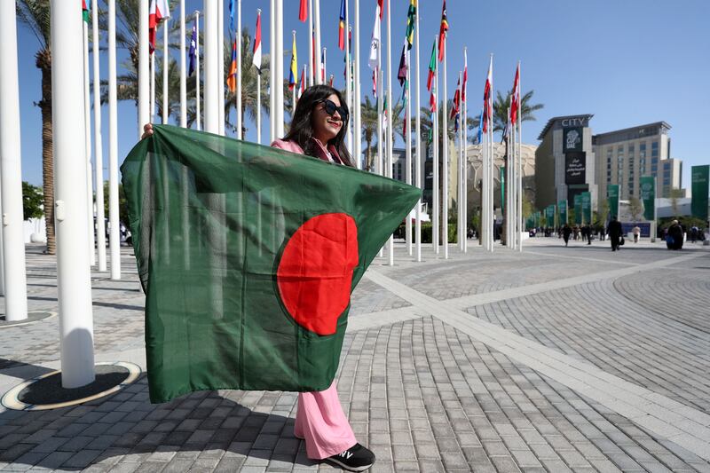 A visitor with the Bangladesh flag. Chris Whiteoak / The National