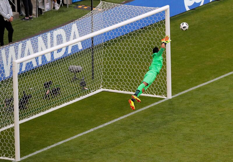 Costa Rica goalkeeper Keylor Navas fails to keep out Kolarov's free-kick. AP Photo