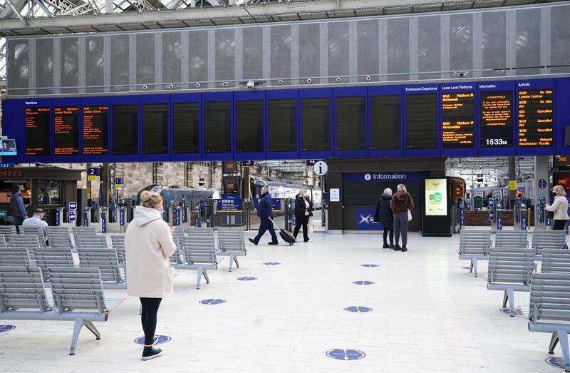 An empty departure board at Glasgow Central Station before Storm Dudley hits. PA