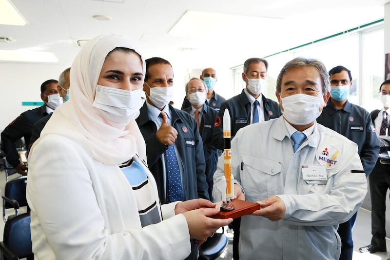 Sarah Al Ameeri, Minister of State for Advanced Sciences of United Arab Emirates, celebrates with Naohiko Abe, Mitsubishi Heavy Industries (MHI) Senior Vice President, Head of Integrated Defence and Space Systems, after the successful launch of the H-2A rocket carrying the Hope Probe, developed by the Mohammed Bin Rashid Space Centre (MBRSC) in the United Arab Emirates (UAE) for the Mars explore, at Tanegashima Space Center on the island of Tanegashima, Japan. REUTERS