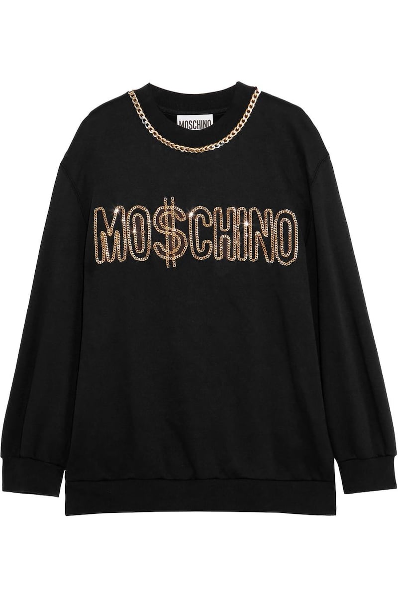 Moschino embellished sweatshirt, Dh1,585 at Theoutnet.com.