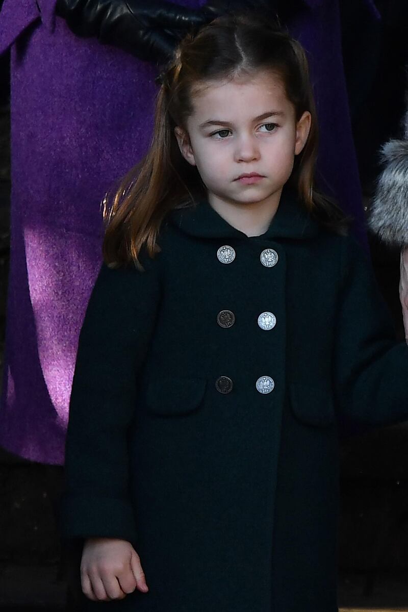 Britain's Princess Charlotte of Cambridge leaves after the Royal Family's traditional Christmas Day service at St Mary Magdalene Church in Sandringham. AFP