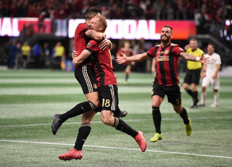 Atlanta United's Franco Escobar celebrates with Jeff Larentowicz after scoring. Reuters