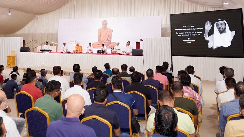 UAE residents gather to offer prayers and pay tribute to Sheikh Khalifa at a Hindu temple under construction in Abu Dhabi.