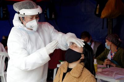 A woman is tested for Covid-19 in Bogota, Colombia, where the Mu variant was first discovered. EPA