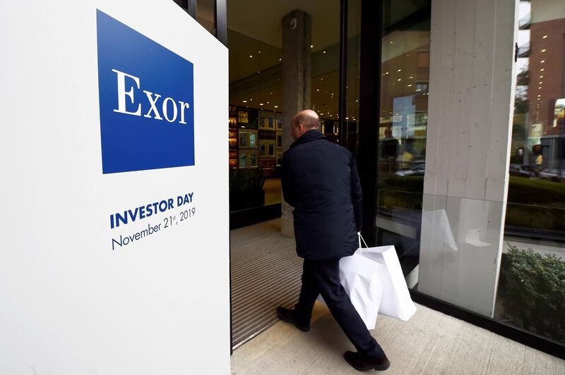 FILE PHOTO: The Exor logo is seen on investor day held by the holding group of Italy's Agnelli family in Turin, Italy, November 21, 2019. REUTERS/Massimo Pinca/File Photo