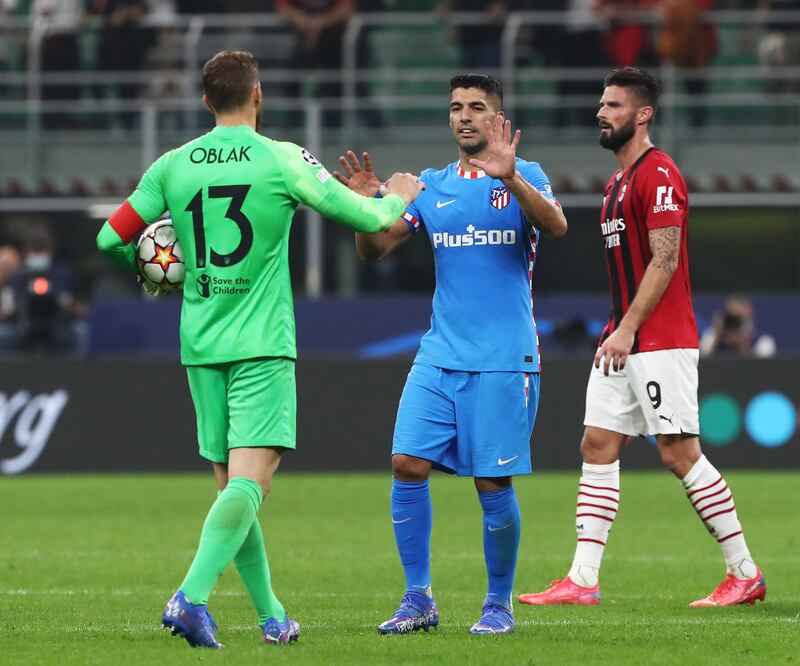 Luis Suarez interacts with Jan Oblak of Atletico Madrid. Getty Images