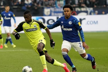 Paderborn's Jamilu Collins (left) and Weston McKennie of Schalke during their Bundesliga match in February before the lockdown. Getty