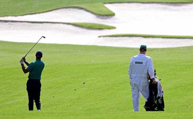 Tiger Woods plays a shot on the 10th hole during a practice round prior to the Masters. AFP