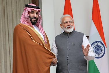 epa07381951 Prince Mohammed Bin Salman Bin Abdulaziz Al-Saud, Crown Prince, Vice President of the Council of Ministers of Defence of the Kingdom of Saudi Arabia (C) and Indian Prime Minister Narendra Modi shake hands prior to a meeting at the president's house in New Delhi, India, 20 February 2019. Prince Mohammed Bin Salman Bin Abdulaziz Al-Saud is on a two-day official visit to India to strengthen political and business ties between the two countries and is scheduled to meet top Indian politicians. EPA/HARISH TYAGI