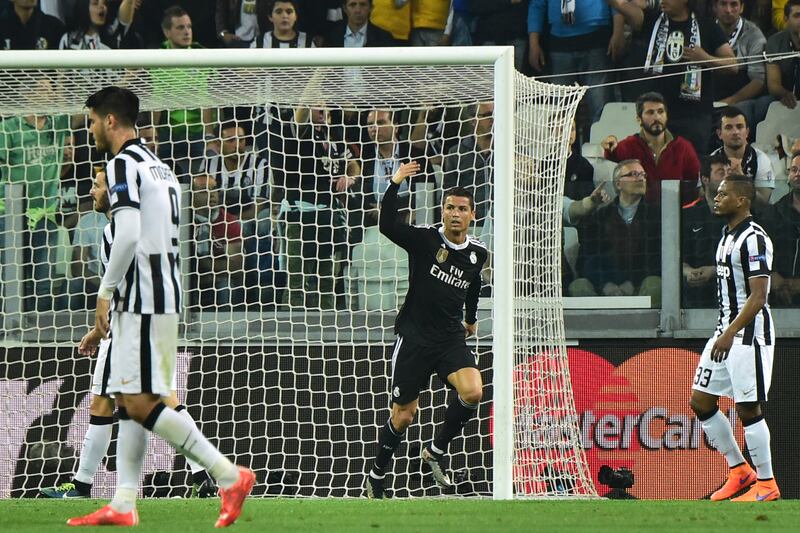 Cristiano Ronaldo celebrates after scoring for Real Madrid in the Champions League semi-final first-leg match at Juventus on May 5, 2015. AFP