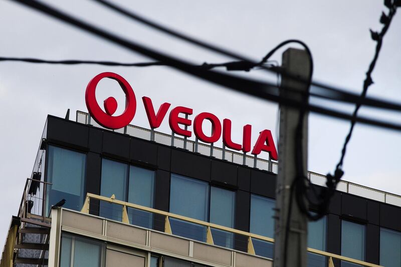 A company logo sits on display at the Veolia Environnement SA headquarters in Paris, France, on Wednesday, Sept. 30, 2020. Engie SA got five more days to consider Veolia Environnement SA’s 3.4 billion-euro bid ($4 billion) for most of its stake in Suez SA, prolonging a corporate fight in the hope of making it less hostile. Photographer: Nathan Laine/Bloomberg