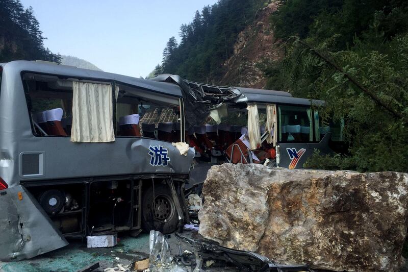 A tour bus damaged during an earthquake is seen in Jiuzhaigou in China's southwestern Sichuan province.  AFP